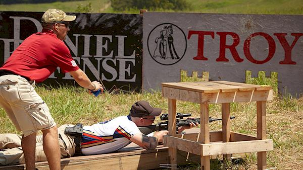 Marksman Laying Prone Shooting at an Outdoor Range